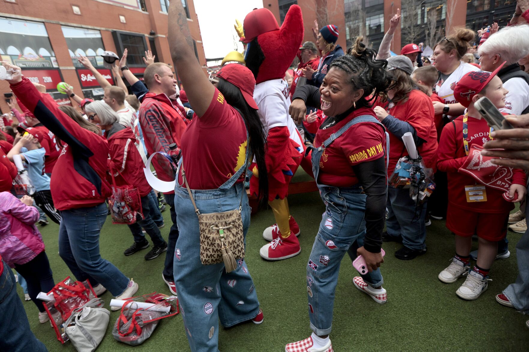 Rain dampens pregame festivities but not spirits